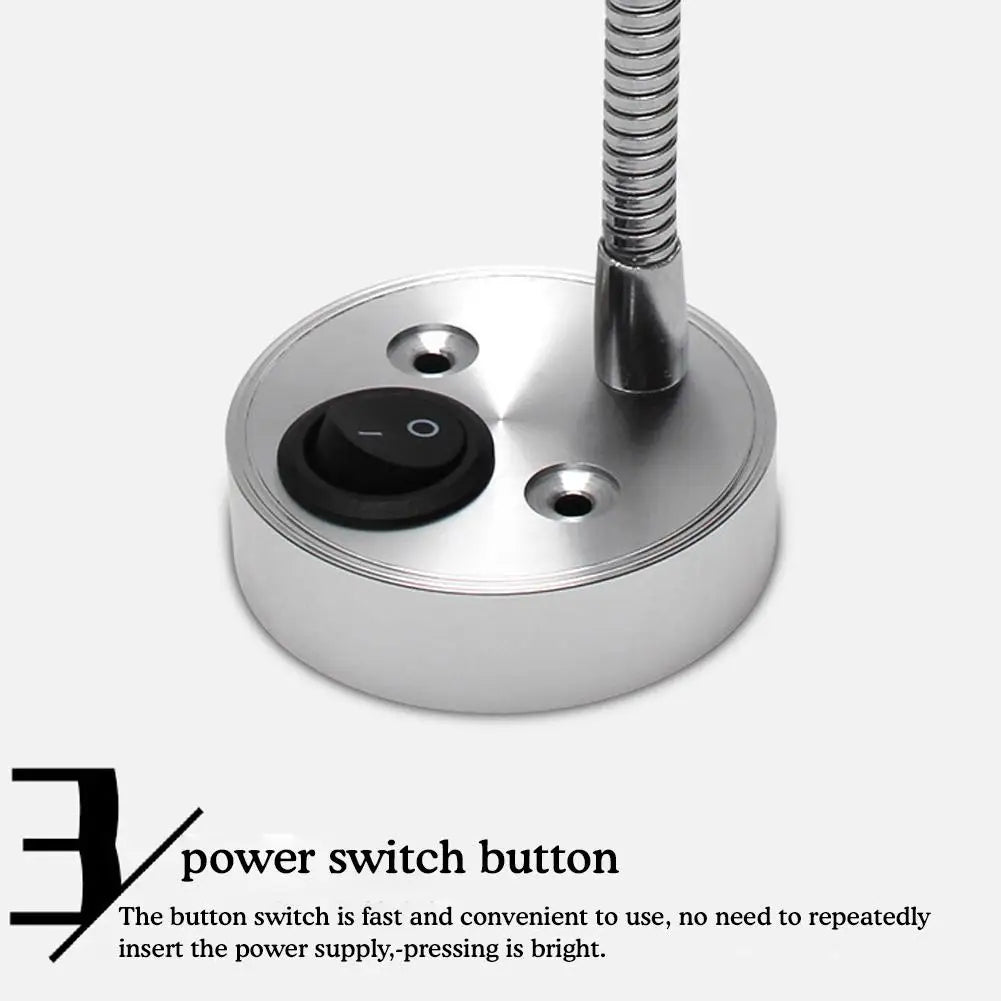 Close-up of power switch button on LED light base